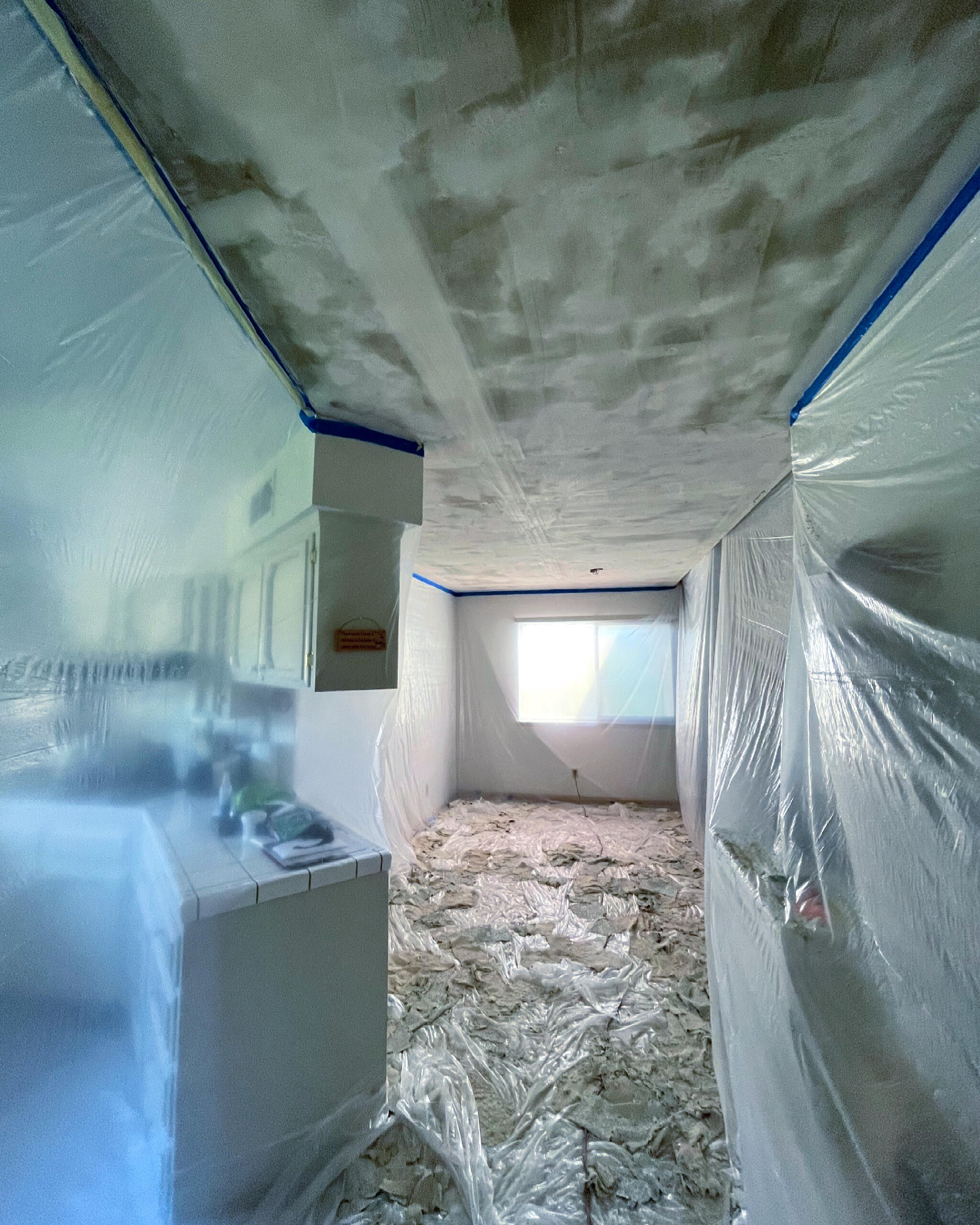 Madera popcorn ceiling removal in progress